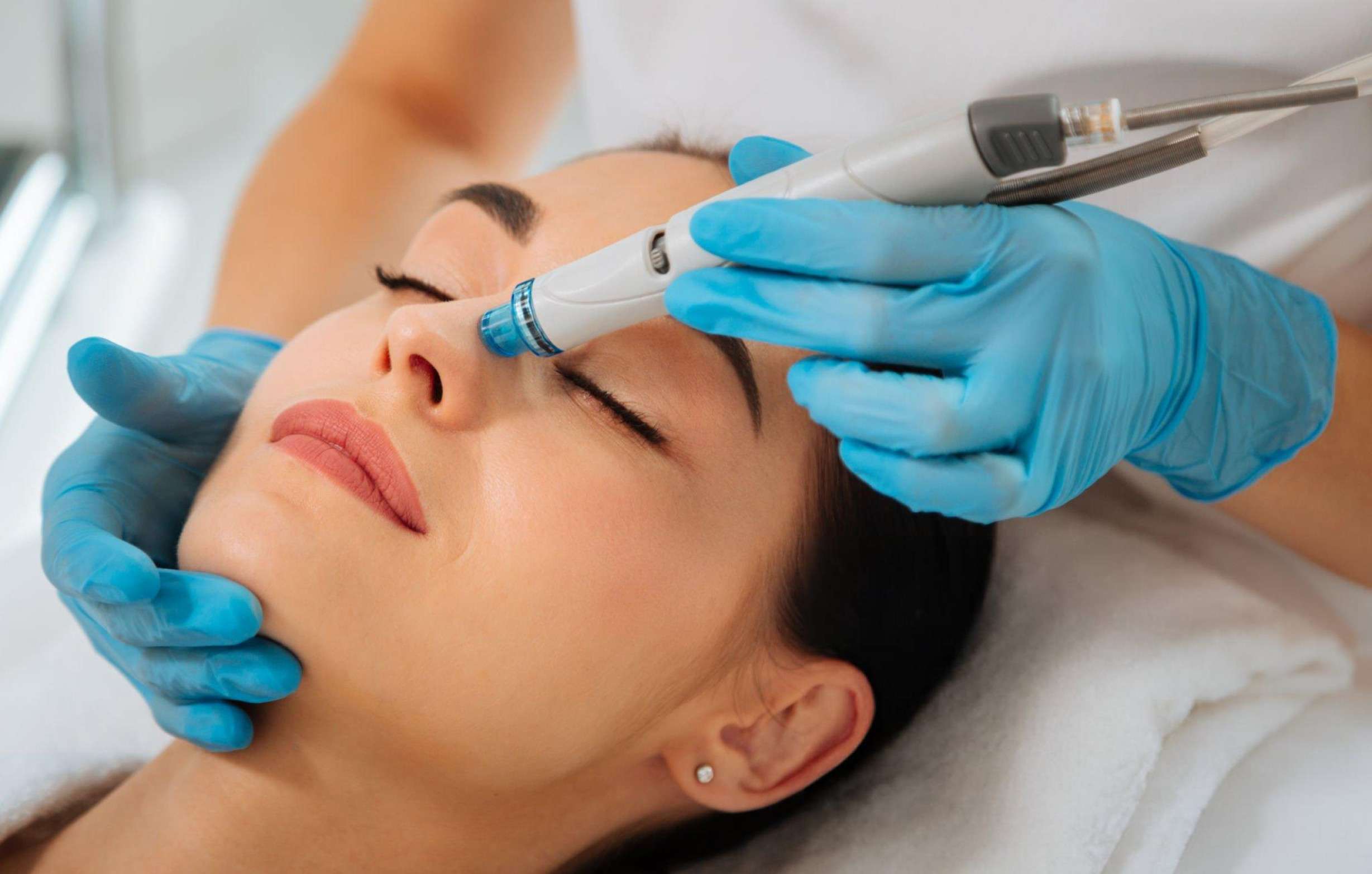 Professional HydraFacial treatment being administered